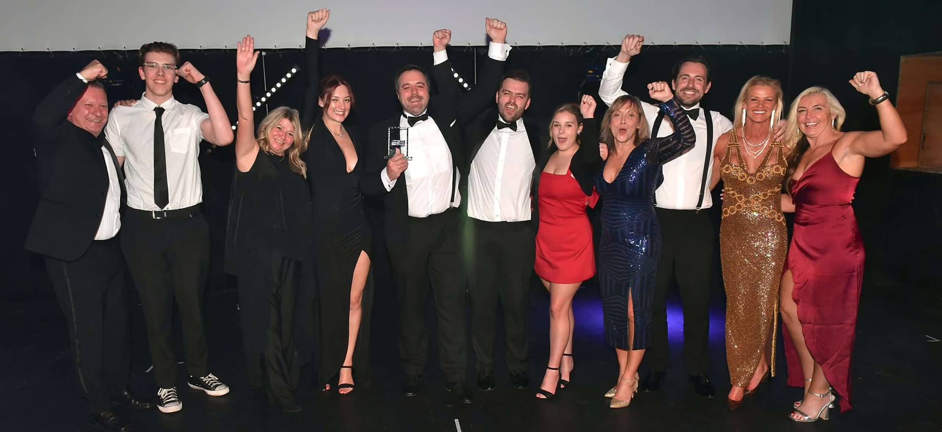 Team-Collecting-trophy-at-the-national-fitness-awards